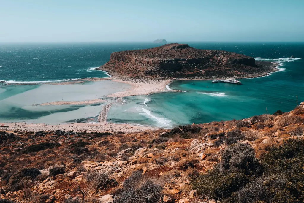 a beach with blue water